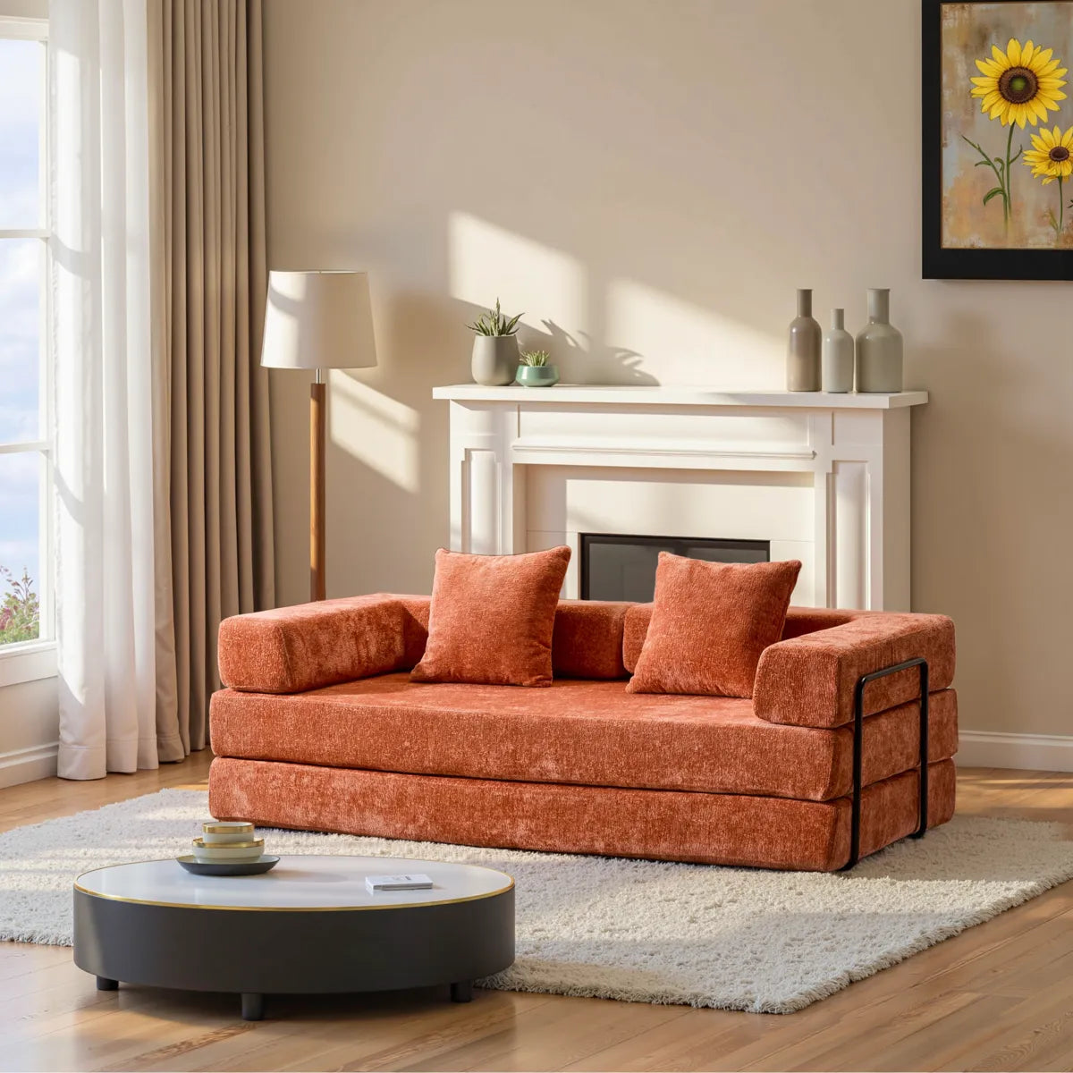 Orange chenille sofa bed with black metal frame