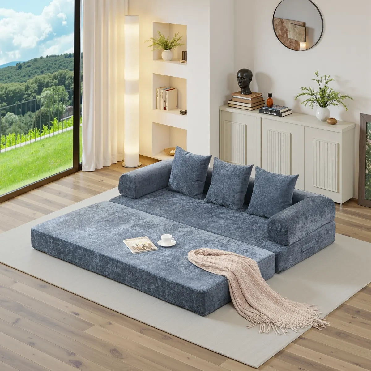 Blue chenille sofa bed unfolded into bed