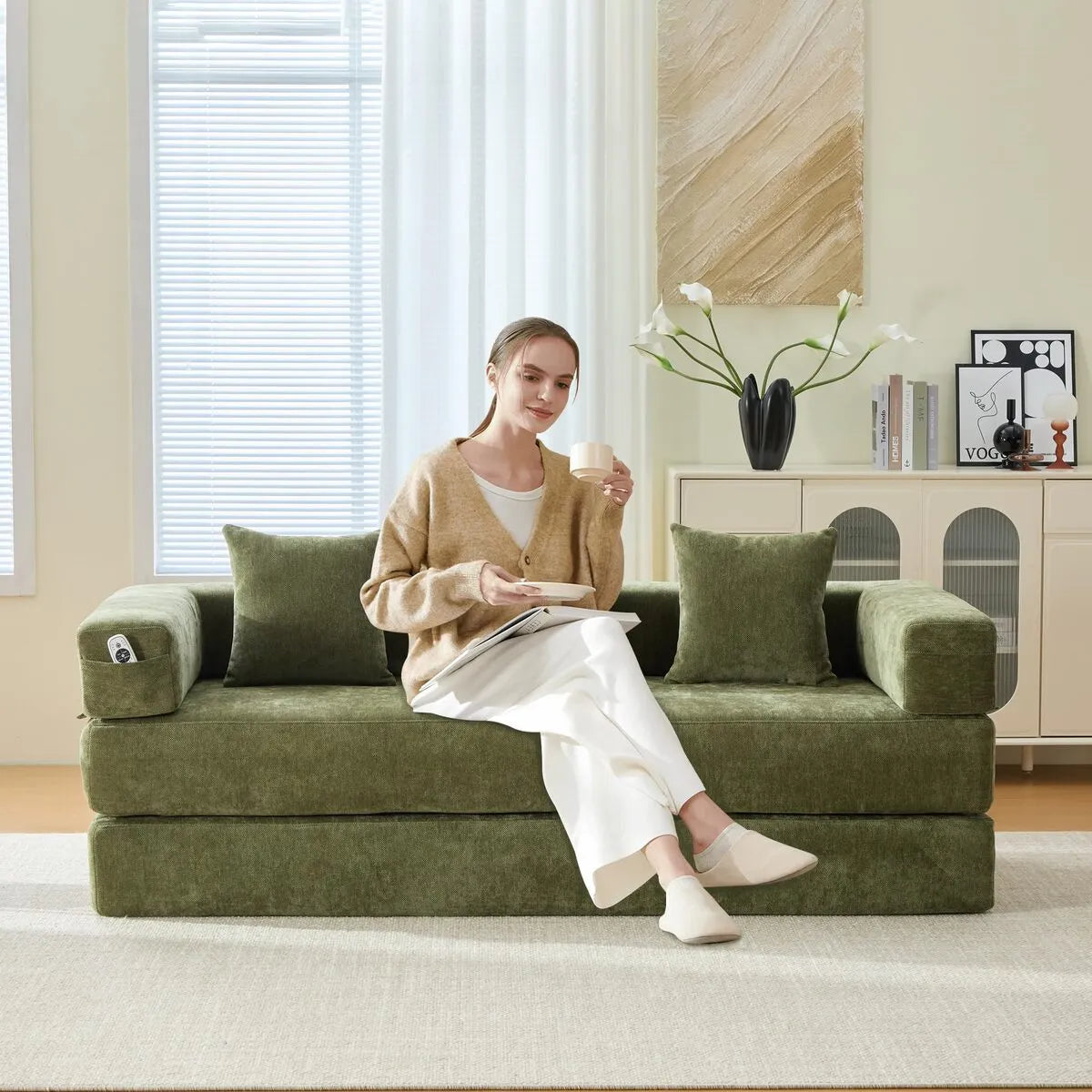 Girl sitting on the King size sofa bed