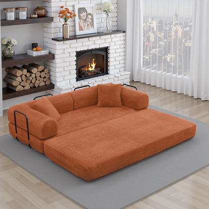 Orange corduroy sofa bed unfolded into bed with black frame