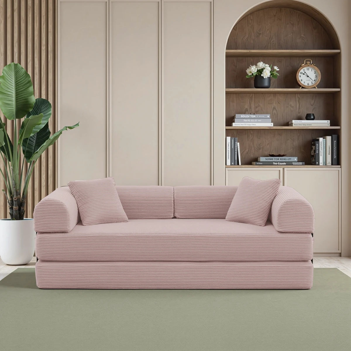 Pink corduroy sofa bed with black metal frame